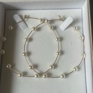 Large gold pearl earrings